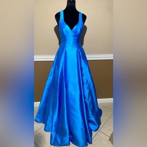 Beautiful blue prom dress. Size 1/2. Worn once.